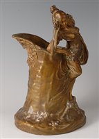 Lot 2098 - An Austrian Art Nouveau pottery wine pitcher,...