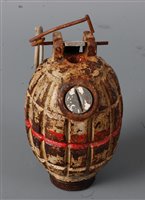 Lot 264 - A deactivated WW II Mills No.36 hand grenade.