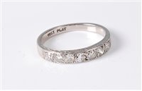 Lot 2576 - An 18ct and platinum seven stone diamond ring,...
