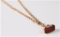 Lot 2611 - A long/guard chain with carnelian fob, the...