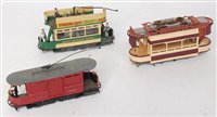 Lot 810 - 4 white metal and 1 diecast trams various...