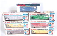 Lot 372 - 7 assorted Lionel plastic bogie wagons...