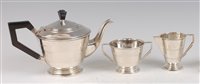 Lot 117 - An Art Deco silver three-piece teaset,...