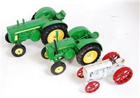 Lot 1237 - Three various loose Ertl heavy metal diecast...