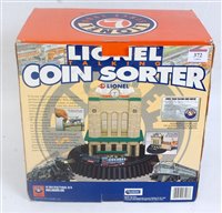 Lot 372 - Lionel Talking Coin Sorter with instructions...