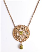 Lot 2675 - A peridot and seed pearl pendant and chain,...
