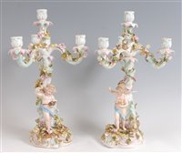 Lot 1080 - A pair of circa 1900 German porcelain four...