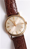 Lot 1232 - A gentleman's Bulova wristwatch, the cream...