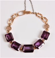 Lot 2637 - A 14k synthetic sapphire bracelet, the five...