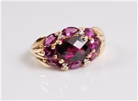 Lot 2665 - A 9ct garnet ring, the central rectangular...