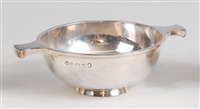 Lot 125 - An Art Deco silver twin handled quaich, of...