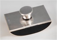 Lot 130 - An Art Deco style silver topped and ebony desk-...