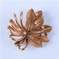 Lot 2594 - A 14ct diamond spray brooch, the leaf shaped...