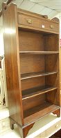 Lot 1250 - A 1930s beaded oak freestanding open bookshelf,...