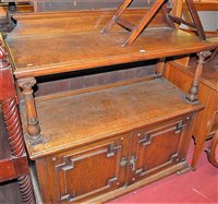 Lot 1266 - A late Victorian oak ledgeback two-tier buffet,...