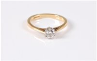 Lot 458 - An 18ct diamond solitaire ring, the round...