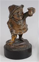 Lot 1261 - A late Victorian bronze match-striker,...