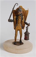 Lot 1262 - A Victorian novelty match-striker, modelled as...