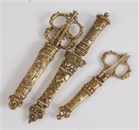 Lot 1288 - Two pairs of Victorian brass desk scissors,...