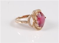 Lot 1185 - A 14k heart shaped ruby and diamond ring, the...
