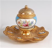 Lot 1274 - A circa 1900 French gilt metal and porcelain...