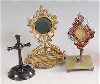 Lot 1296 - A Victorian cast brass watch holder, the back...