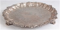 Lot 1128 - A George III silver salver, having a piecrust...
