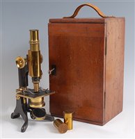 Lot 1242 - A late 19th century lacquered brass monocular...