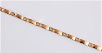 Lot 2589 - A 9ct diamond bracelet, the small round...