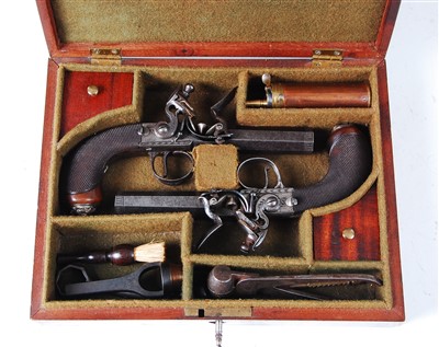 Lot 228 - A cased pair of 19th century travelling pistols