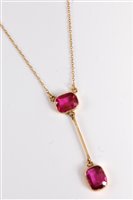 Lot 2619 - A 9ct red stone pendant necklace, the two oval...