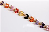 Lot 2615 - A multi gemset bracelet, the multi gemset...