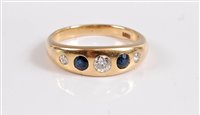 Lot 2517 - A gentleman's 18ct sapphire and diamond ring,...