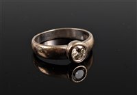 Lot 2564 - An 18ct diamond solitaire ring, the round...