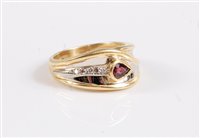 Lot 2624 - An 18ct ruby and white hardstone ring, the...