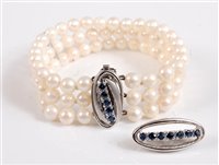 Lot 2512 - A 14ct white gold sapphire and cultured pearl...