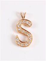 Lot 2592 - A diamond 'S' pendant, the letter S pendant...