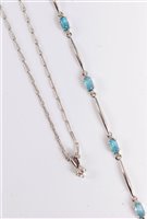 Lot 2671 - An 18ct diamond pendant and a 9ct topaz and...