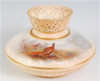Lot 1035 - *A Royal Worcester porcelain vase, of squat...
