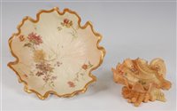 Lot 1063 - *A Royal Worcester porcelain blush ivory lotus...
