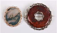 Lot 2658 - A moss agate brooch and a red jasper brooch,...