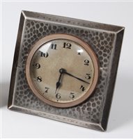 Lot 178 - An early 20th century Tudric pewter bedside...