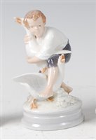 Lot 54 - *Royal Copenhagen - a glazed porcelain figure...