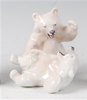 Lot 55 - *Royal Copenhagen - a glazed porcelain group...
