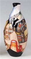 Lot 2 - A Moorcroft pottery vase in the Village...