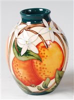 Lot 6 - A Moorcroft pottery vase in the Orange Blossom...