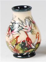 Lot 15 - A small Moorcroft pottery vase in the Minuet...