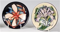 Lot 18 - A Moorcroft pottery circular pin tray in the...