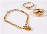 Lot 445 - A signet ring and cross set ring, (marks worn,...