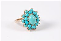 Lot 403 - A 9ct turquoise cluster ring, the oval...